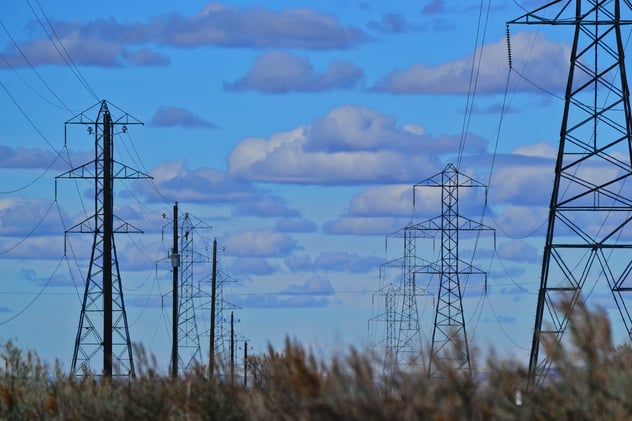 low-angle-view-of-posts-under-blue-calm-sky-918986